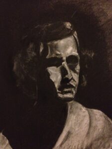 2014 self portrait of the artist in charcoal. Chiaroscuro.